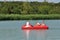 Family on pedalo on the pond of the leisure center of Jonzac