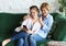 Family, people and technology. Aged woman and her adult daughter using smartphone at home