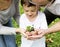 Family planting a tree together