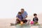 Family playing on the beach. Parents and children relaxing on the beach in the summer.happy healthy family Grandfather and Nephew