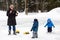 Family Playing Outside in the Winter