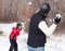 Family playing snowball