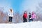 Family playing snowball