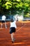 Family playing tennis