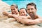 Family portrait in swimming pool