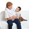 Family portrait on white background, happy people sit on sofa. Grandmother with grandchild.