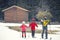 Family practicing cross-country skiing. The volcano Mount Etna, Sicily. Italy.