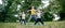 Family Practicing Yoga For Happiness in Nature