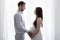 Family, pregnancy and parenthood concept - happy pregnant couple