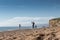 Family prepare to fly a kite on sunny beach