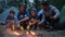 Family preparing fried yellow corn at night evening on rest in forest, picnic outdoors, American family