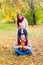 Family pretend pyramid autumn park