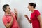 A family quarrel, the wife scolds her husband, a young, beautiful wife yells at her husband. The concept of the psychology of