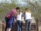 A Family Reads a Sign at the Murray Springs Clovis Site