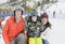 Family Ready to Ski with a Toddler Boy Dressed in all Safety Gear