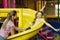 Family recreation. Cute girl with her mom on slide at indoor children playground