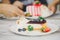 Family relax time ,Blueberry Cheese pie on white plate in soft focus with fresh fruit decoration and blurred adult and giving