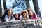 Family Resting On Hike Through Countryside