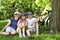 Family resting in a park