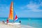 A family rides a catamaran at Varadero beach in Cuba