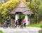 Family rides in the park on bicycles