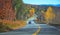 Family Road Trip, Scenic Drive with view of Colorful Autumn Leaves Color Season Scenery. Holiday, Vacation, Leisure Travel in