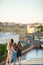 Family on rooftop enjoying with view of beautiful sunset in Sankt Petersburg in Russia