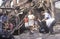 Family rummaging through home burned during riots, South Central Los Angeles, California