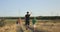 Family running in field