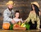 Family rustic style farmers market with fall harvest. Harvest festival concept. Family farmers with harvest wooden