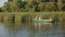 Family sails in a wooden boat