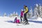 Family on the ski slope