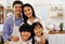 Family smile portrait cooking food in kitchen room at home.