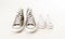 Family sneakers canvas shoes of father and child on white in single parent family concept