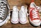 Family Sneakers canvas shoes parents and child on wood floor at home in happy lifestyle
