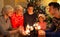 Family with sparklers at Christmas time