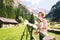 Family spend summer holiday in Dolomites, South Tyrol, Italy, Eu