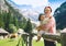 Family spend summer holiday in Dolomites, South Tyrol, Italy, Europe