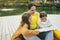 Family spending time together by the lake