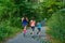 Family sport, mother and kids jogging outdoors