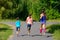 Family sport, mother and kids jogging outdoors