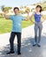 Family in sportswear standing outdoors