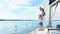 Family Standing On Yacht Deck Sailing Across The Sea, Panorama