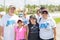 Family stop for pictures during a catholic community charity walk