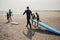 Family Surfing at the Beach
