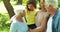 Family talking together in park