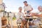 Family of three having break in the terrace