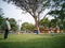 Family of three playing ball in the Malaysia park