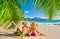 Family with three year old boy on beach. Seychelles, Mahe