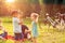 Family time- Happy children chase bubbles in nature